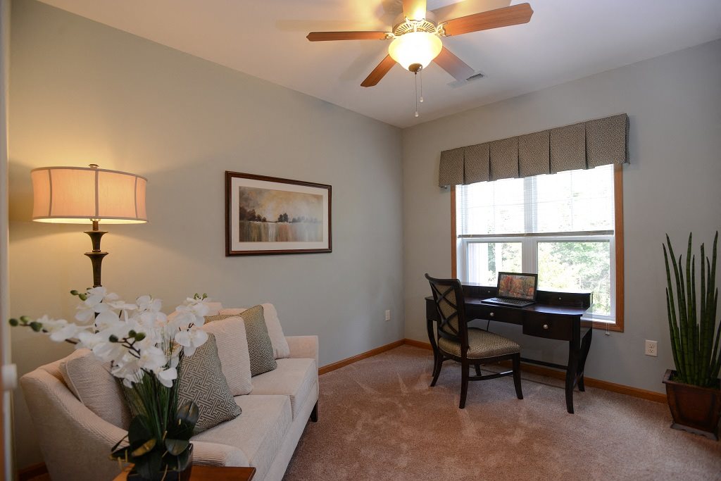 Living Rooms With Wall to Wall Carpeting at The Highlands at Mahler Park Apartments 55+, Neenah, Wisconsin